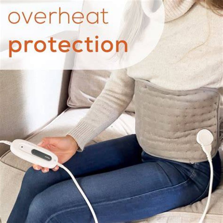 Is a heating pad good for abdominal pain?