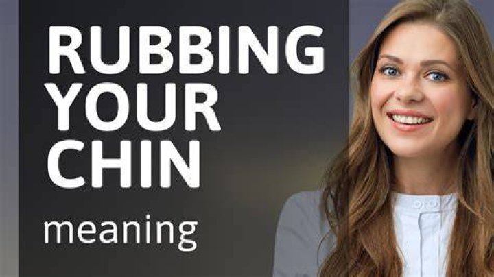 What does rubbing your chin mean in body language?